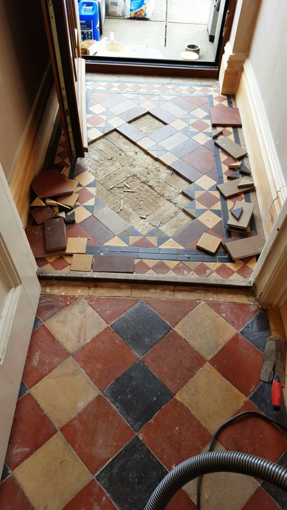 Victorian tiled lobby floor during restoration Swansea