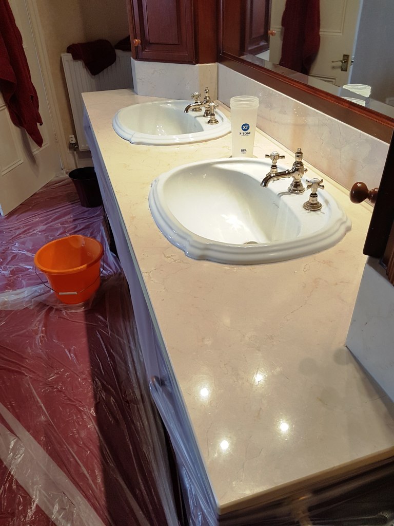 Polishing Marble Counter Tops In An Opulent Bowden Bathroom